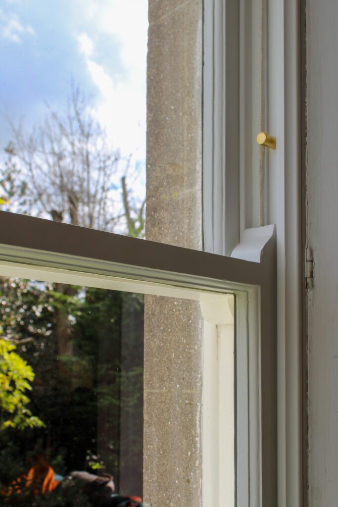 horn detail on refurbished sash window